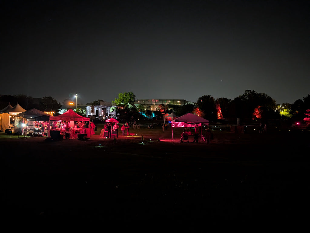 image of Plantasia at night on the lawn of the garfield park conservatory