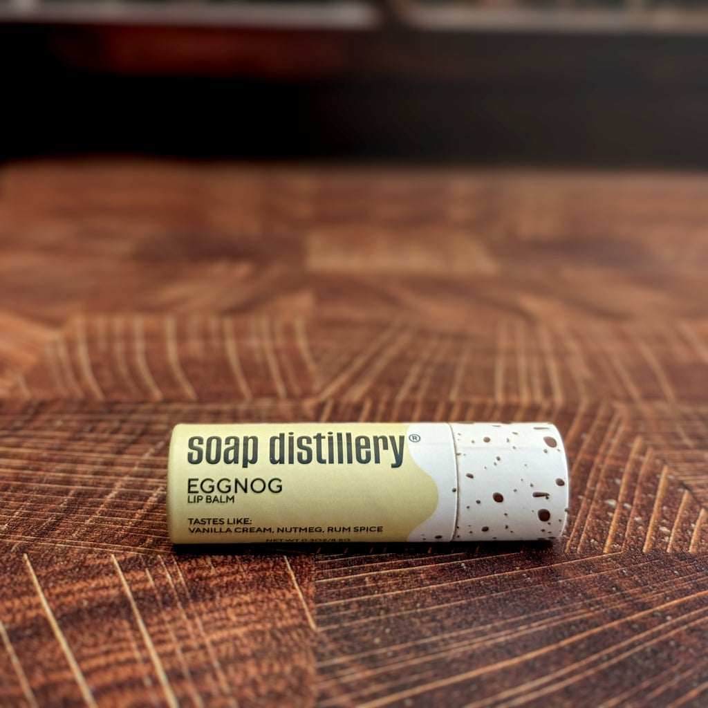 eggnog lip balm in paperboard packaging on a wooden table